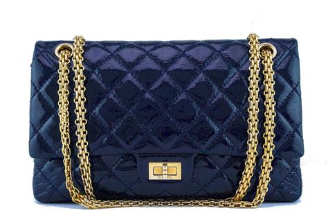 navy blue chanel bag with gold chain|chanel blue flap bag.